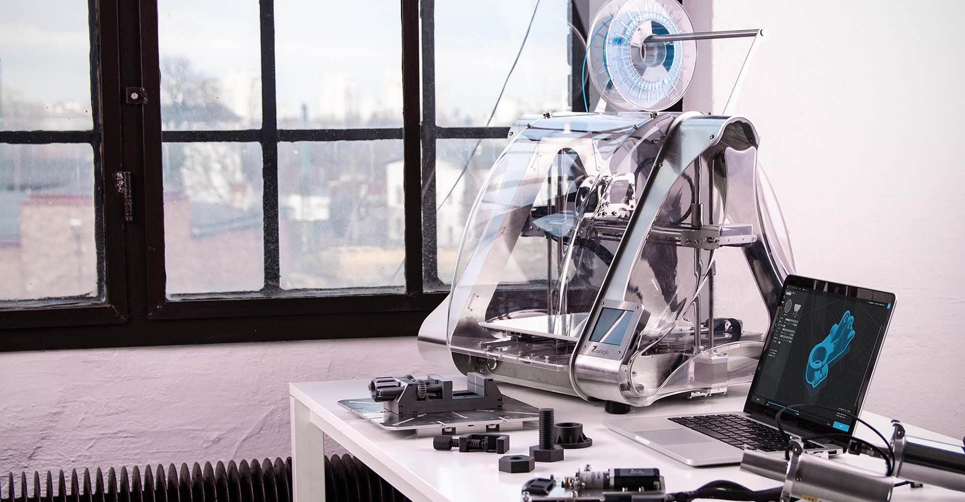 3d printer and computer on desk